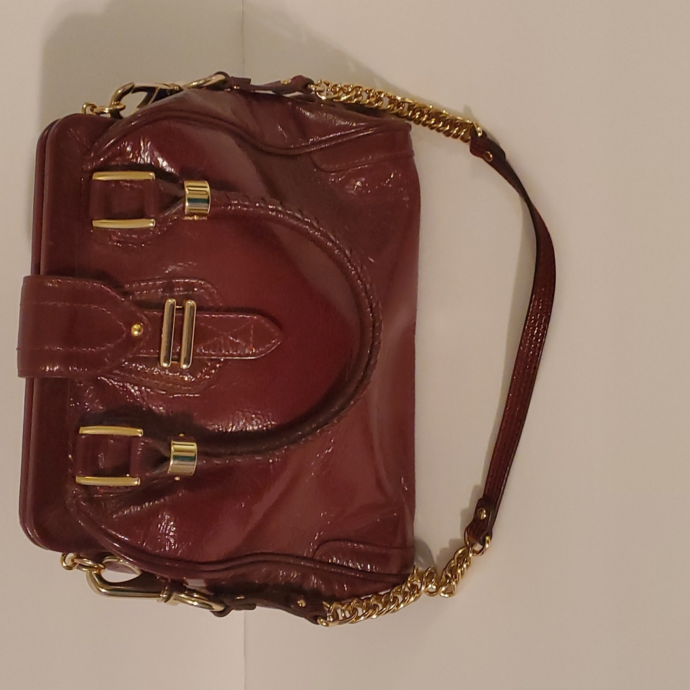 SOLD-Cole Haan burgundy patent leather vintage purse with gold colored hardware